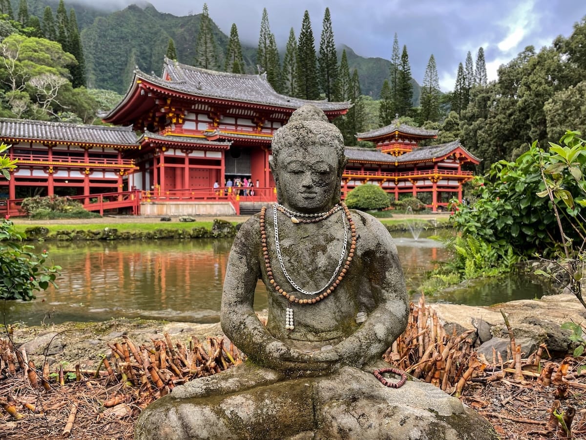 A Buddha statue in front of the Byodo-In Temple on Oahu